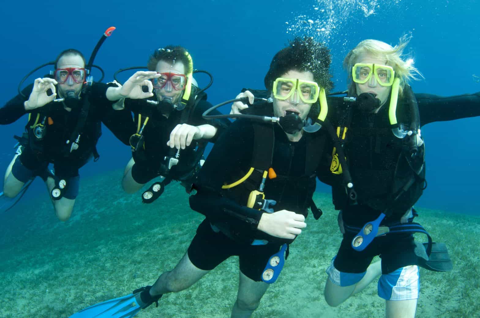 The Most Important Hand Signals To Know When Diving