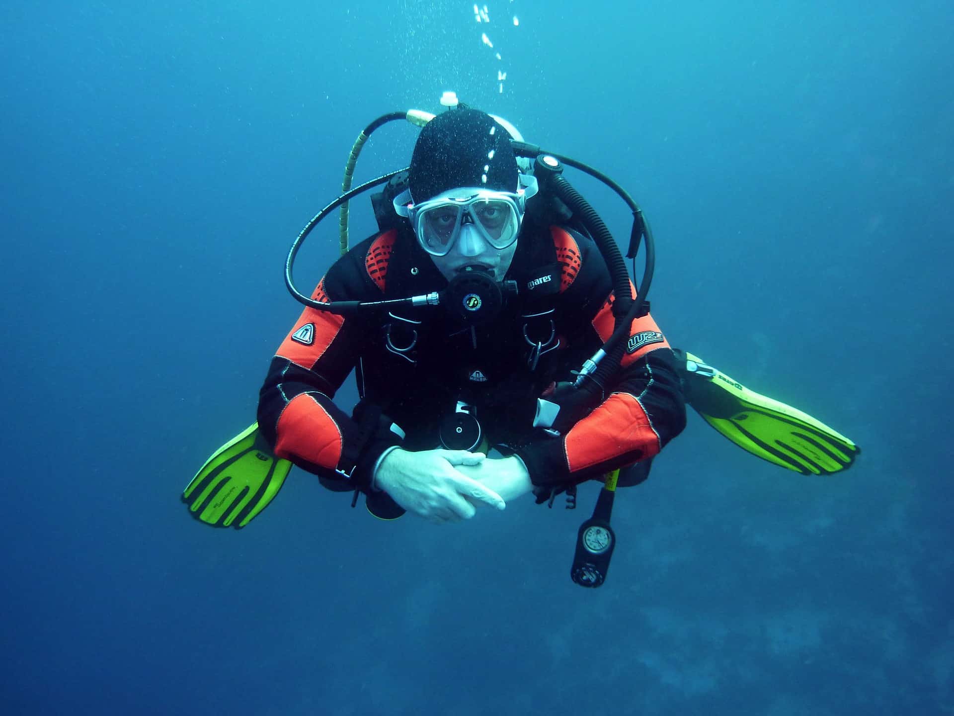 Scuba diver is wearing the best deep sea diving suit